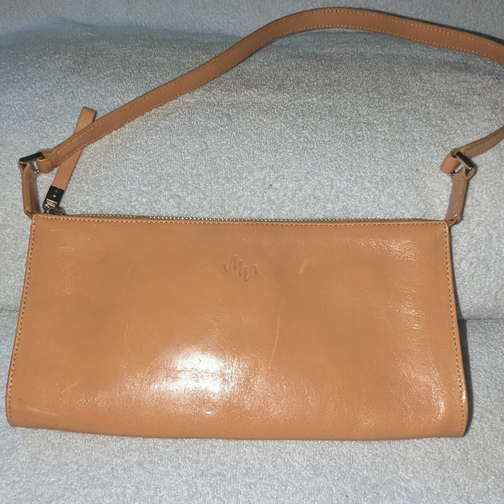 Monsac tan leather bag.